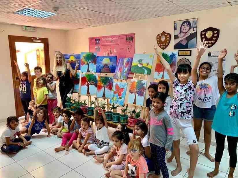Children pose in art and craft classes for kids