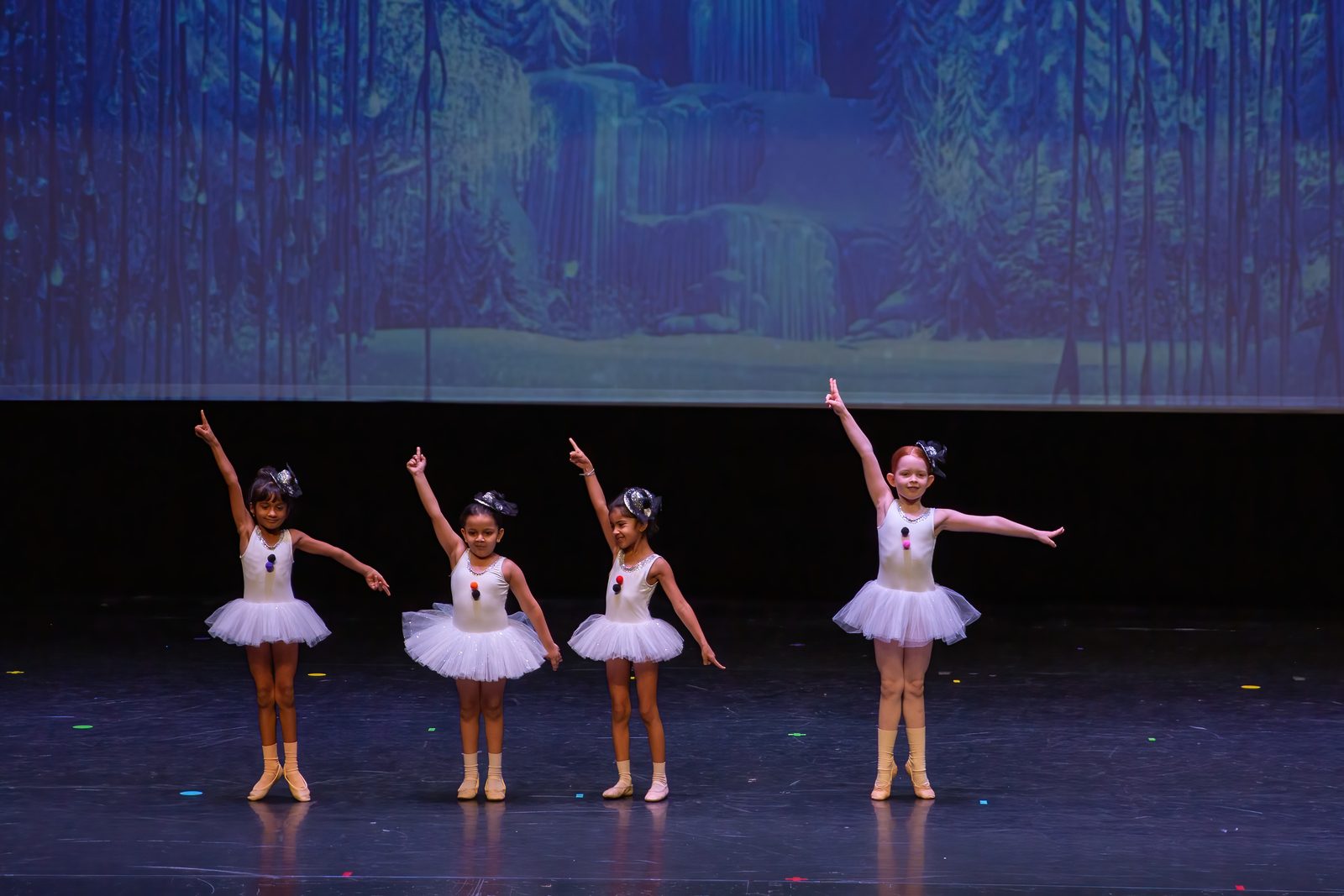 Children doing ballet on stage