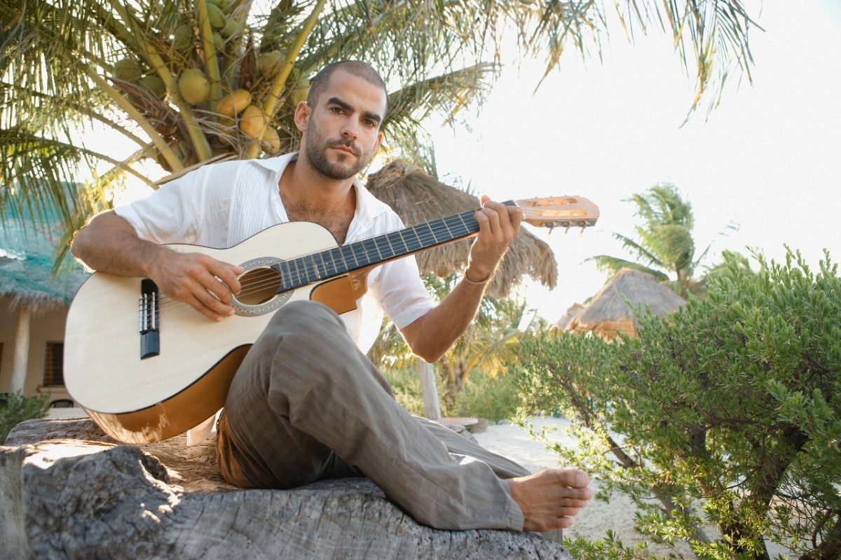Young man playing the guitar