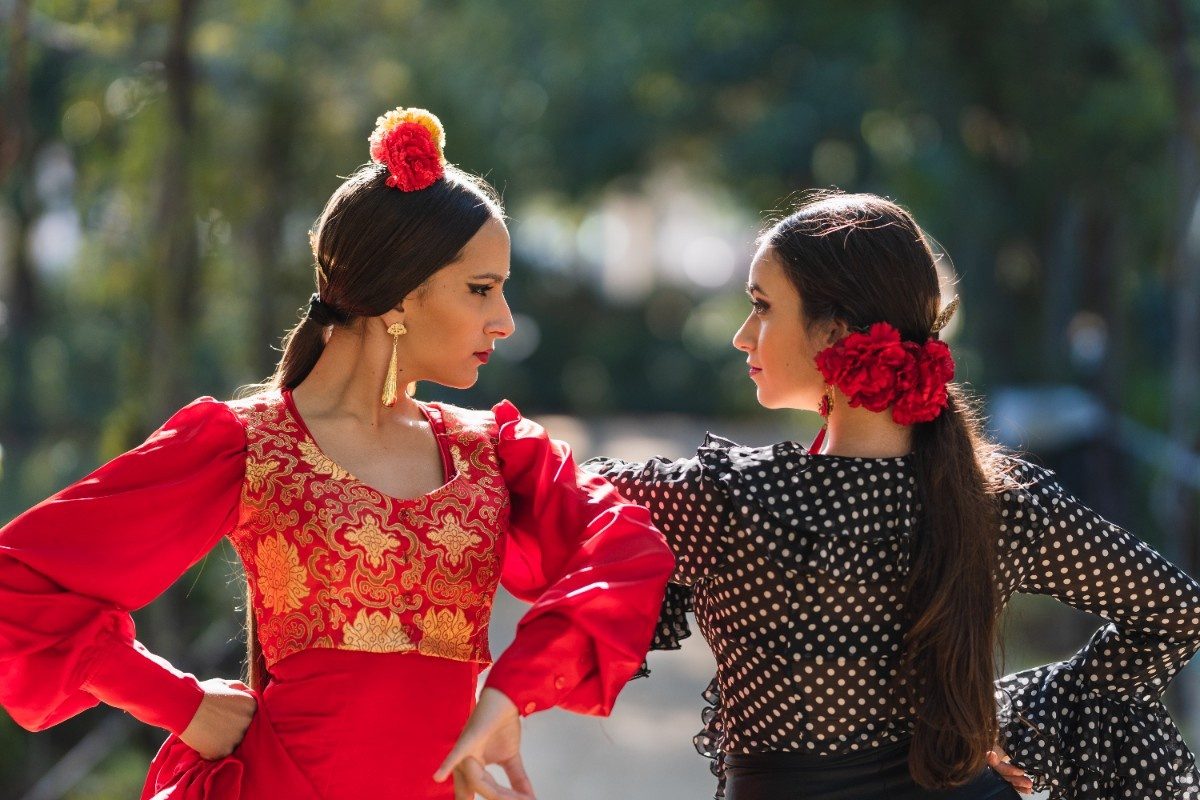 two-women-in-flamenco-traditional-costume-dancing