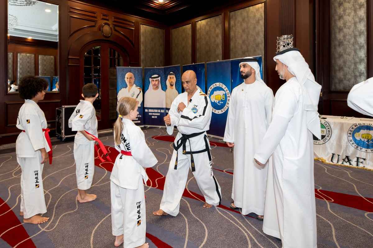 children at a taekwondo award giving ceremony