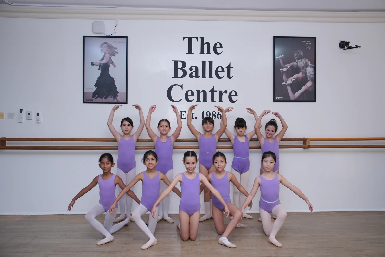 A ballet class at the barre