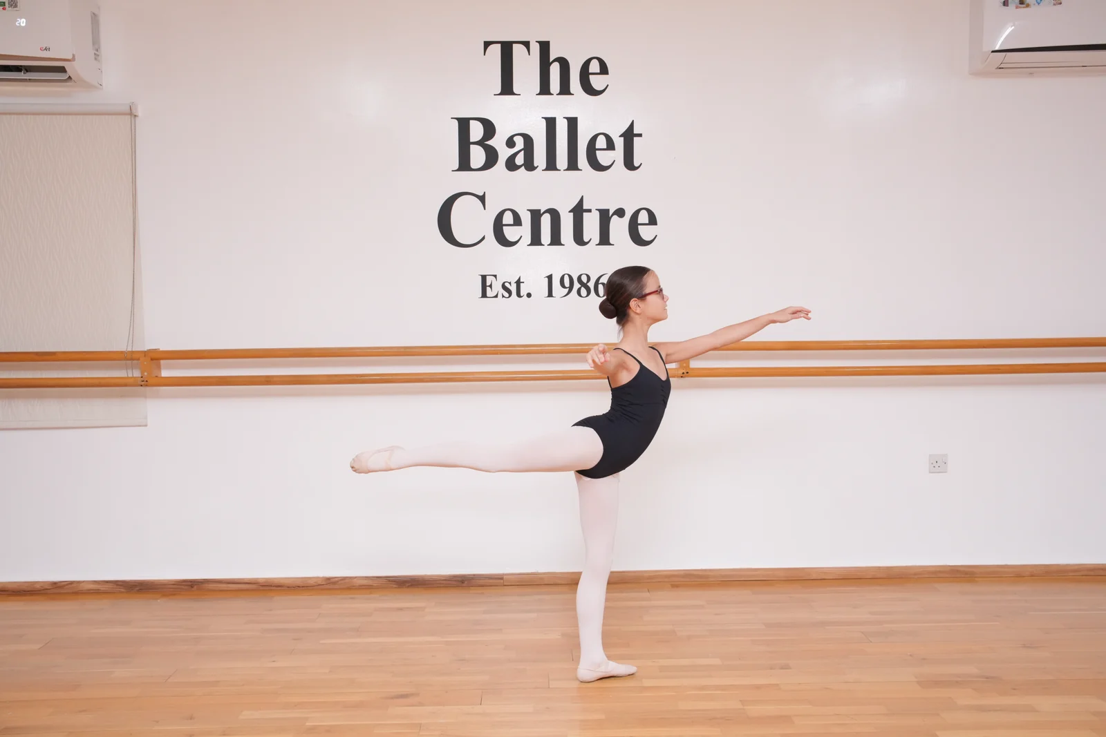 An arabesque, centre floor
